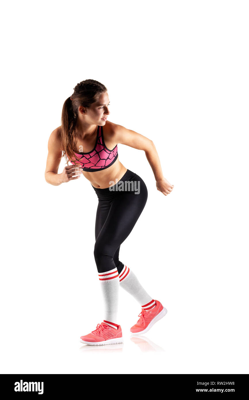 full lenght fit girl running, isolated on white background Stock Photo