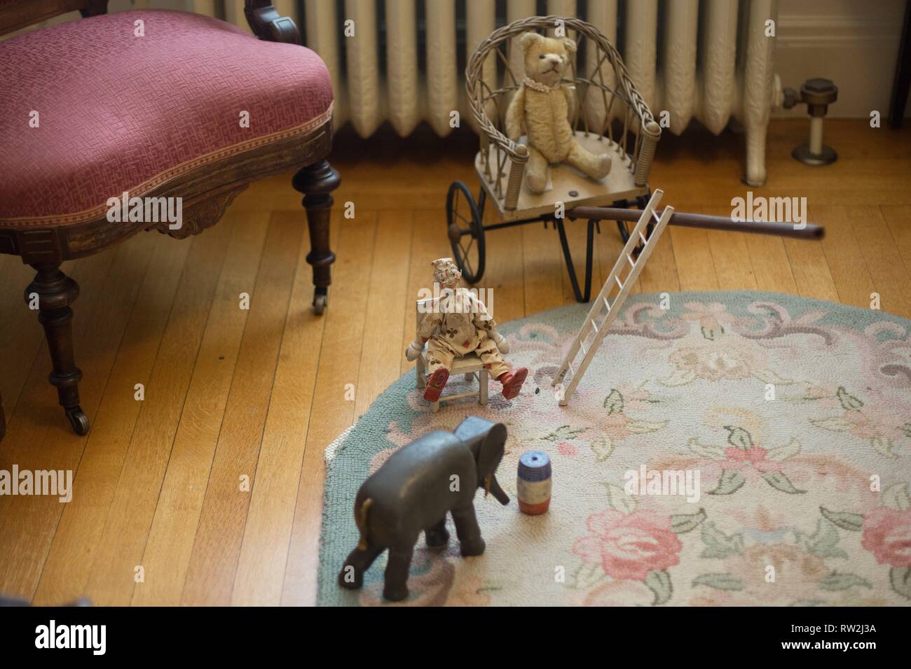 Children's toys on a bedroom floor on display at Pittock Mansion in