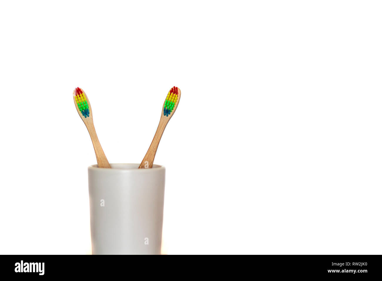 Two eco bamboo toothbrushes on white background with copy space Stock ...