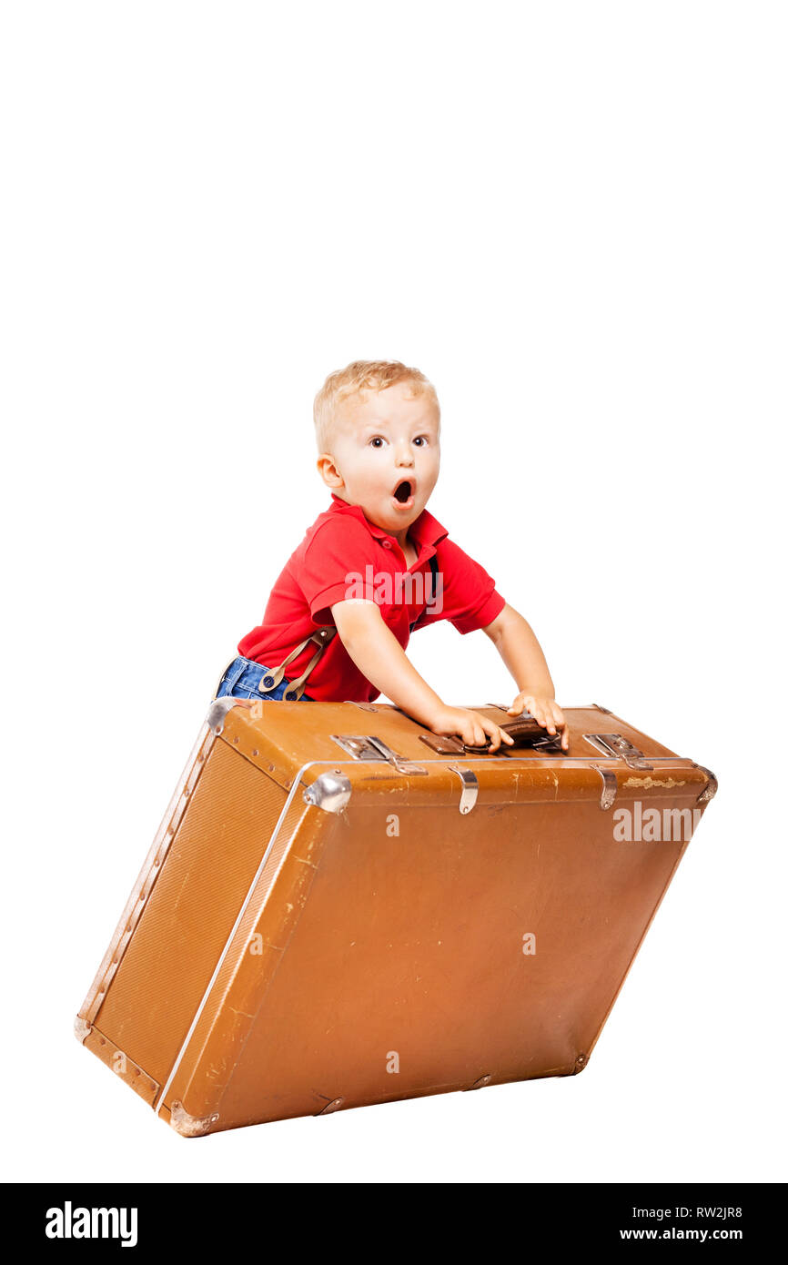 Small Child With Large Vintage Suitcase Falling Isoletad On White Small child with large vintage suitcase falling isoletad on white