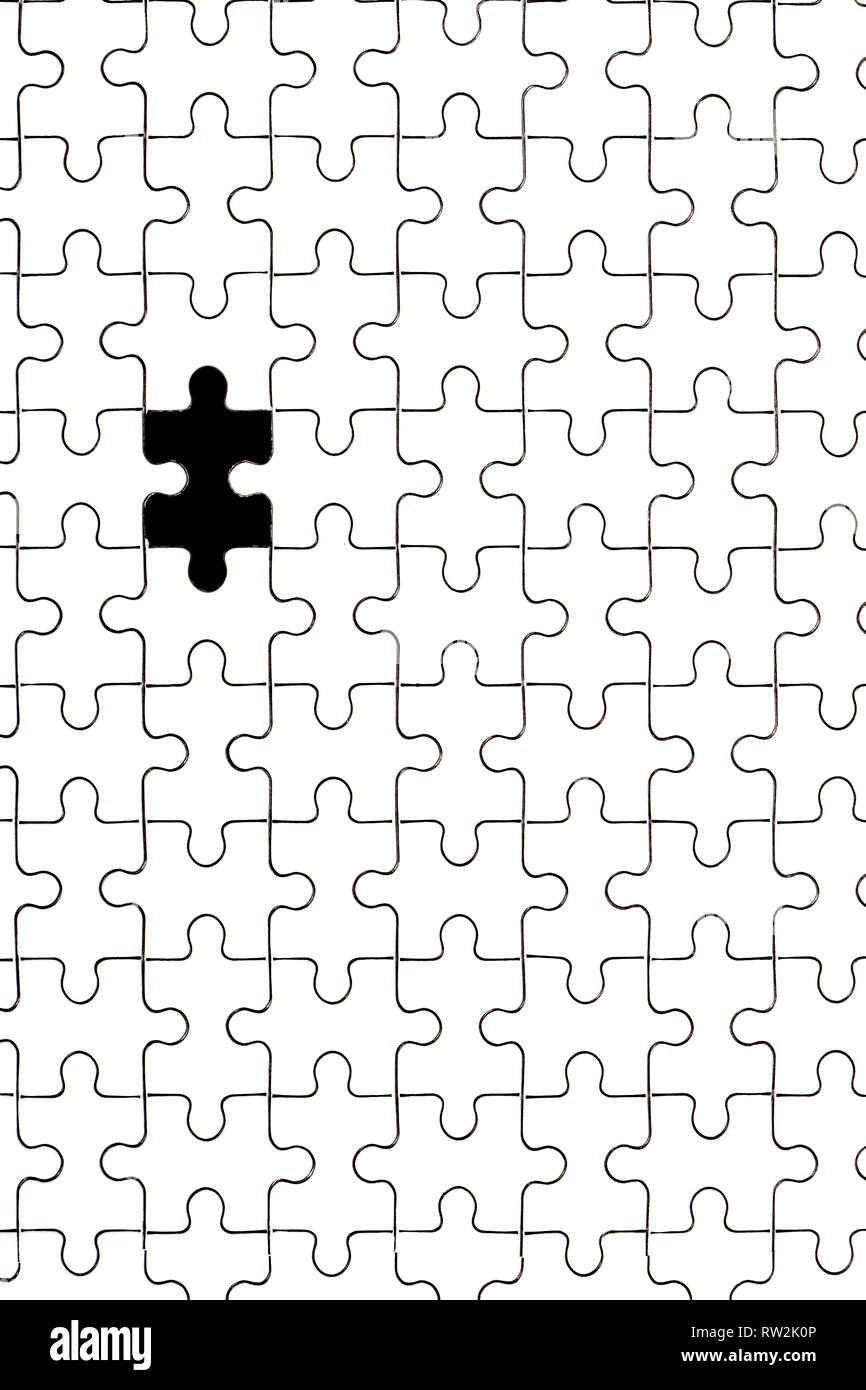 White jigsaw puzzle with one piece missing stock photo alamy
