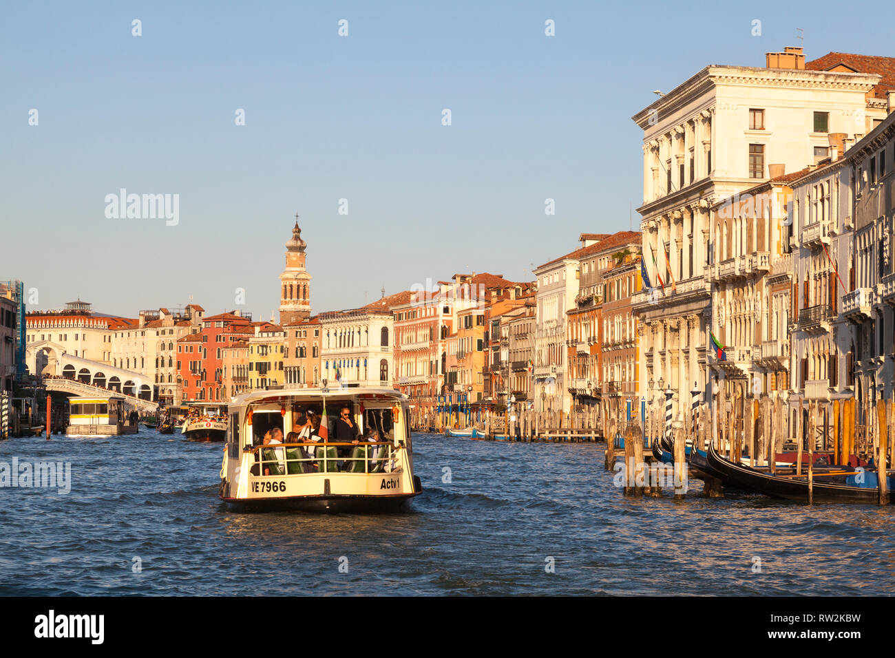 Vaporetto waterbus on the Grand Canal at sunset, Venice, Veneto, Italy ...