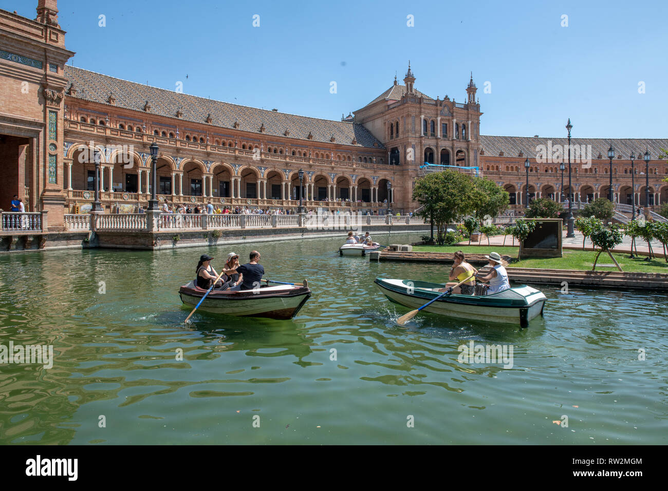 People boat on canal in Plaza de Espa–a -Seville , Spain Stock Photo