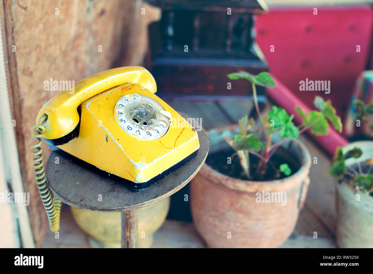 Retro rotary telephone on wood table Stock Photo - Alamy