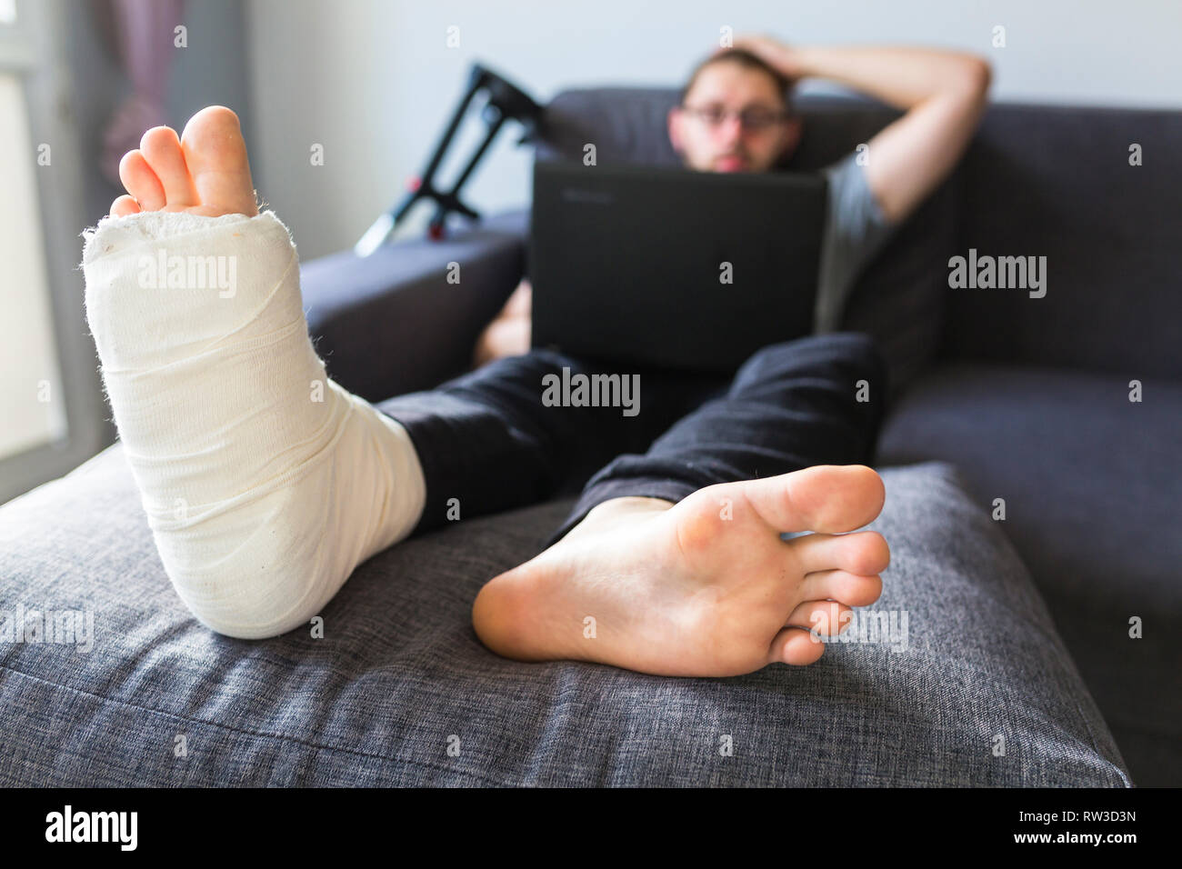 Convalescence at home after breaking the leg Stock Photo