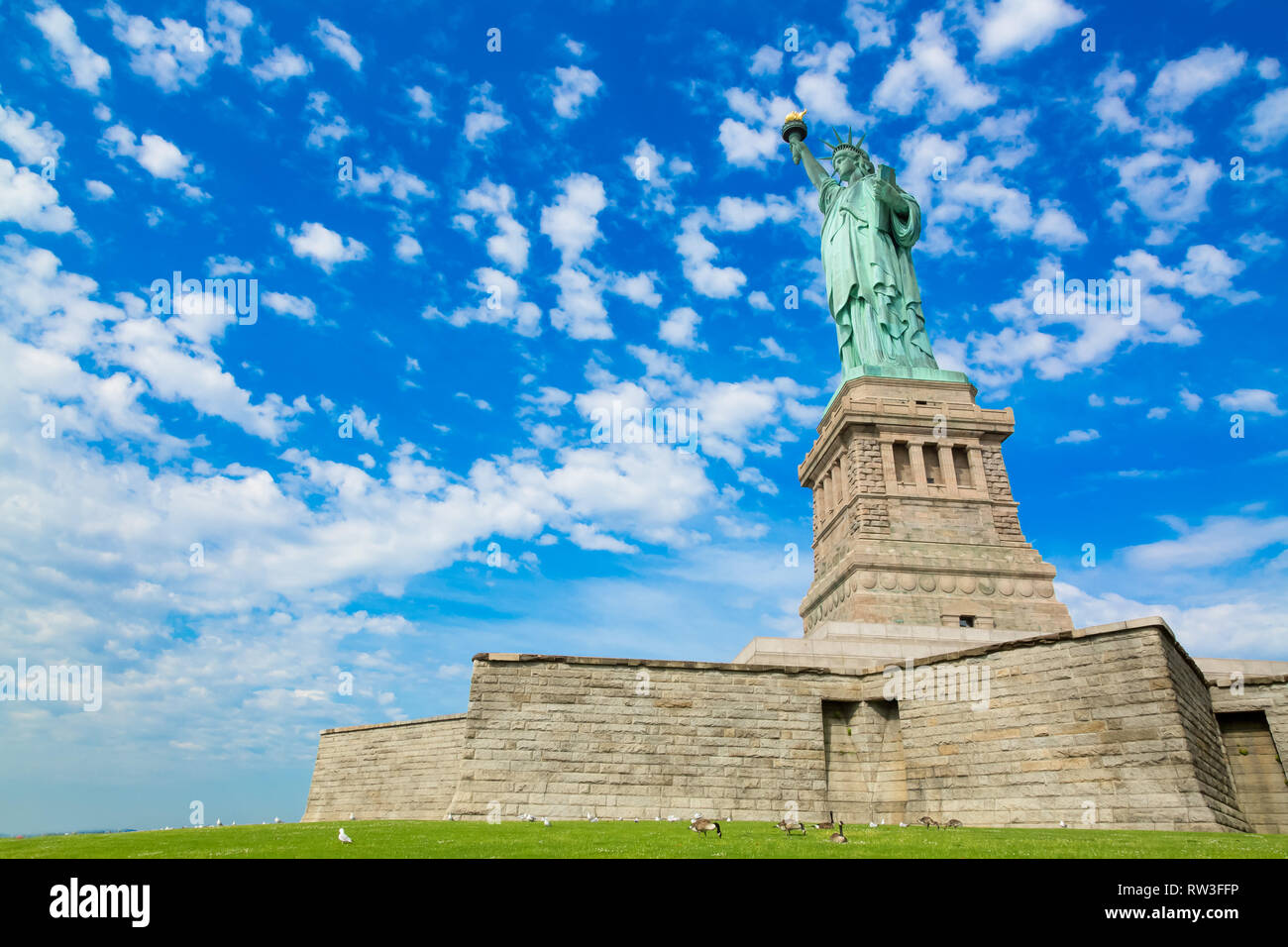 The Statue of Liberty is a colossal neoclassical sculpture on Liberty Island in New York Harbor