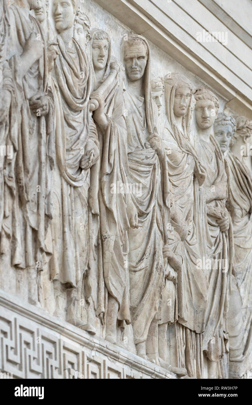 Rome. The Ara Pacis Augustae, 13-9 BCE, Ara Pacis Museum. Section of processional on the wall depicting Marcus Agrippa and the fam Stock Photo -