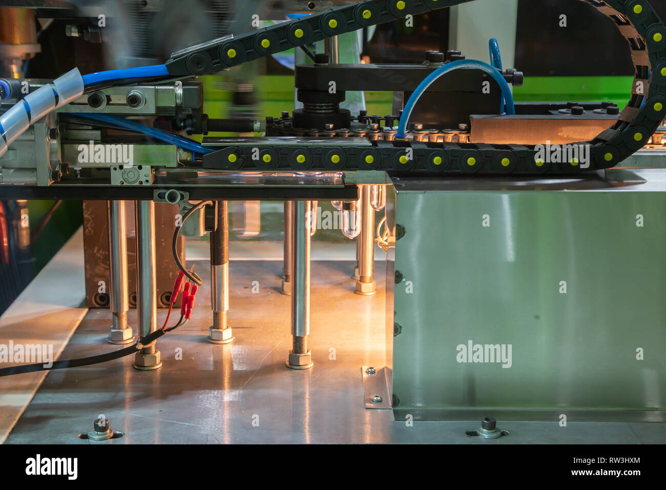 Heating process for plastic bottle blowing machine Stock Photo Alamy