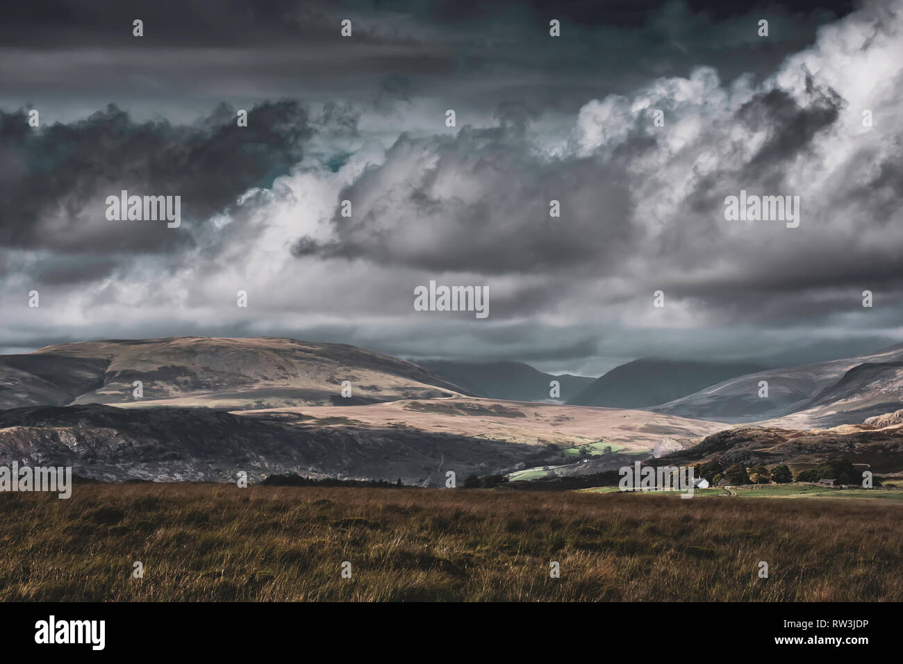 Dark Dramatic Sky With Rainclouds Over Scenic Mountain Valley With Sunlight Painting On Hills Slopes Beautiful Scenery Of English Lake District Majes Stock Photo Alamy Dark Dramatic Sky With Rainclouds Over Scenic Mountain Valley With Sunlight Painting On Hills Slopes Beautiful Scenery Of English Lake District Majes Stock Photo Alamy