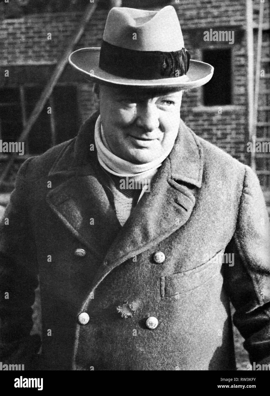 Winston Churchill at the building of a new cottage at Chartwell. February 1938 Stock Photo
