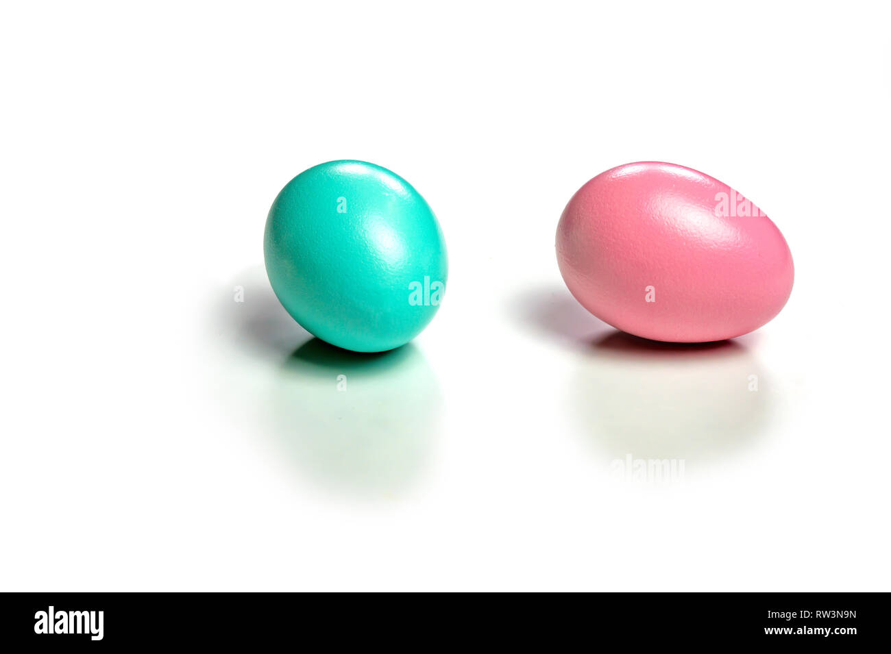 2 colorful easter eggs isolated on white background with shadows Stock Photo