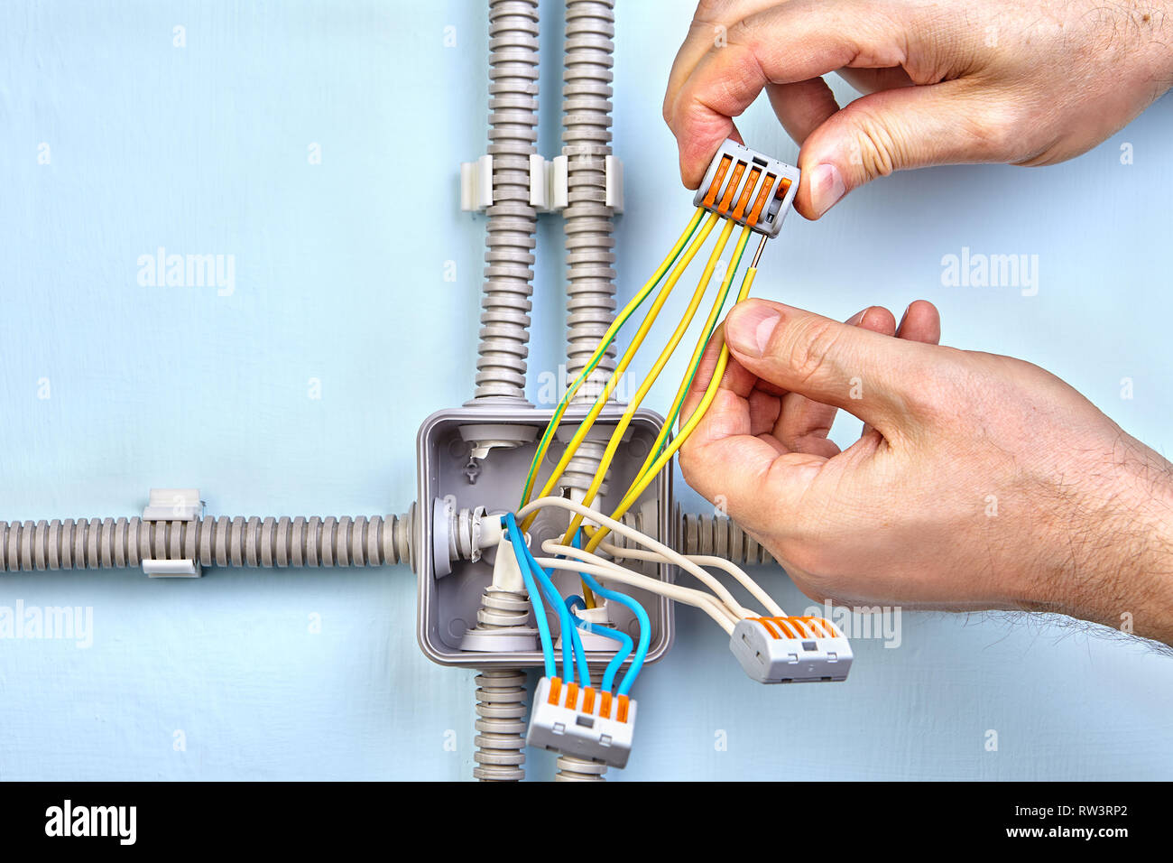 Plastic junction box designed for surface mounting, connecting wires