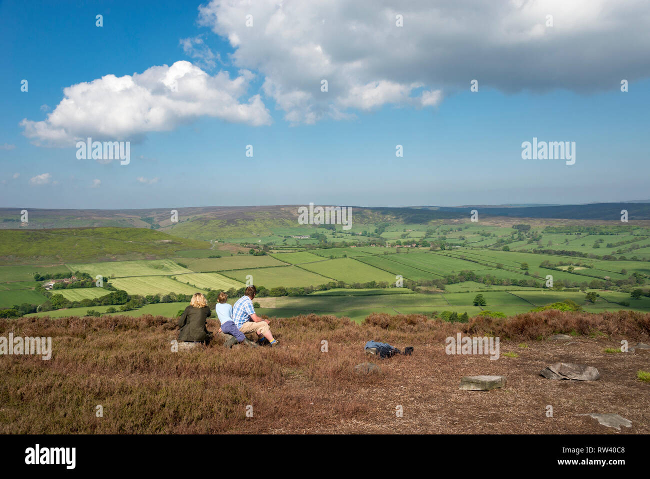 Family enjoying the view of Westerdale from Castleton Rigg in the North York Moors National Park, England. Stock Photo
