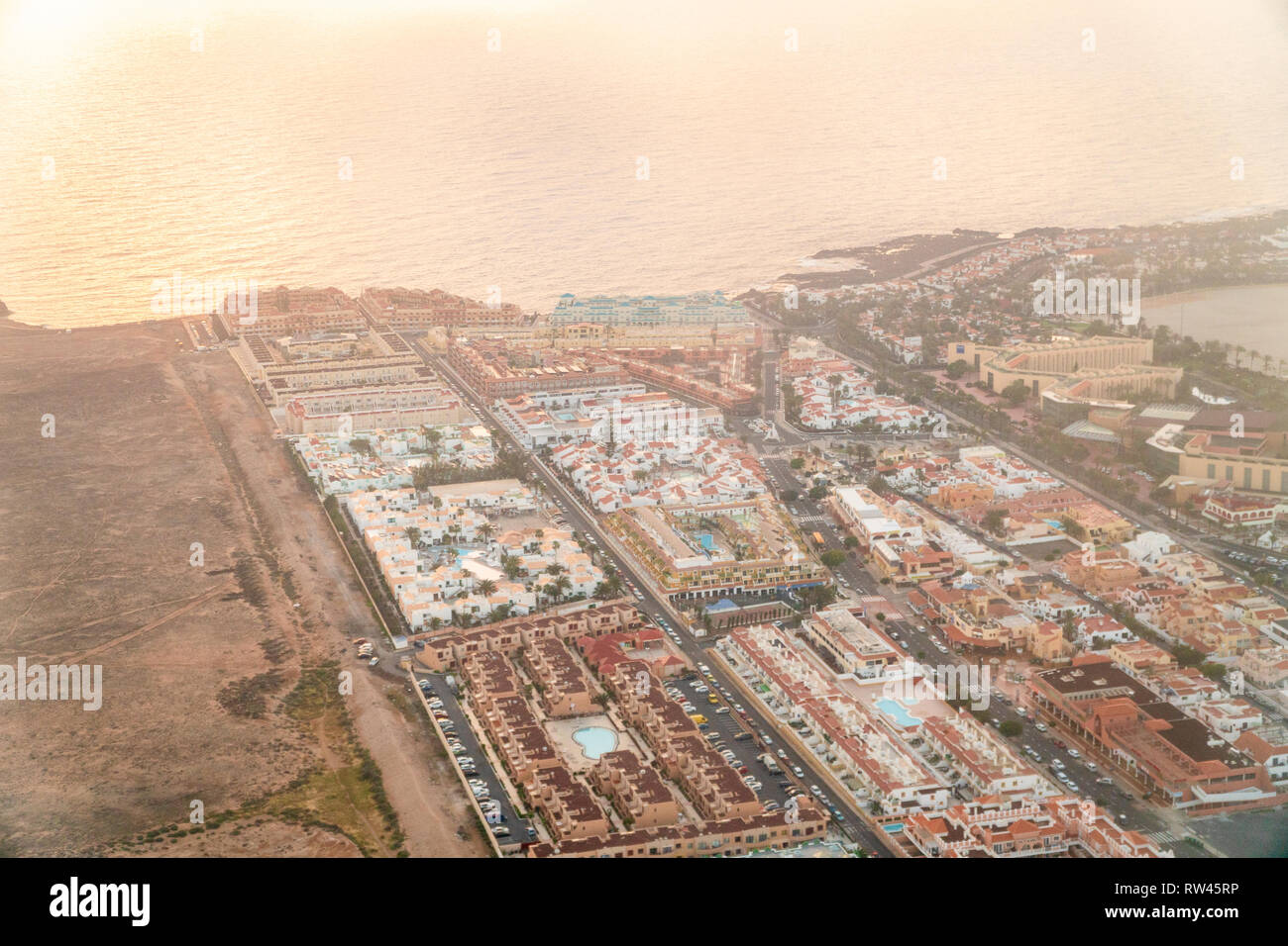 Aerial view of Caleta de Fuste with many resorts, Fuerteventura, Spain Stock Photo