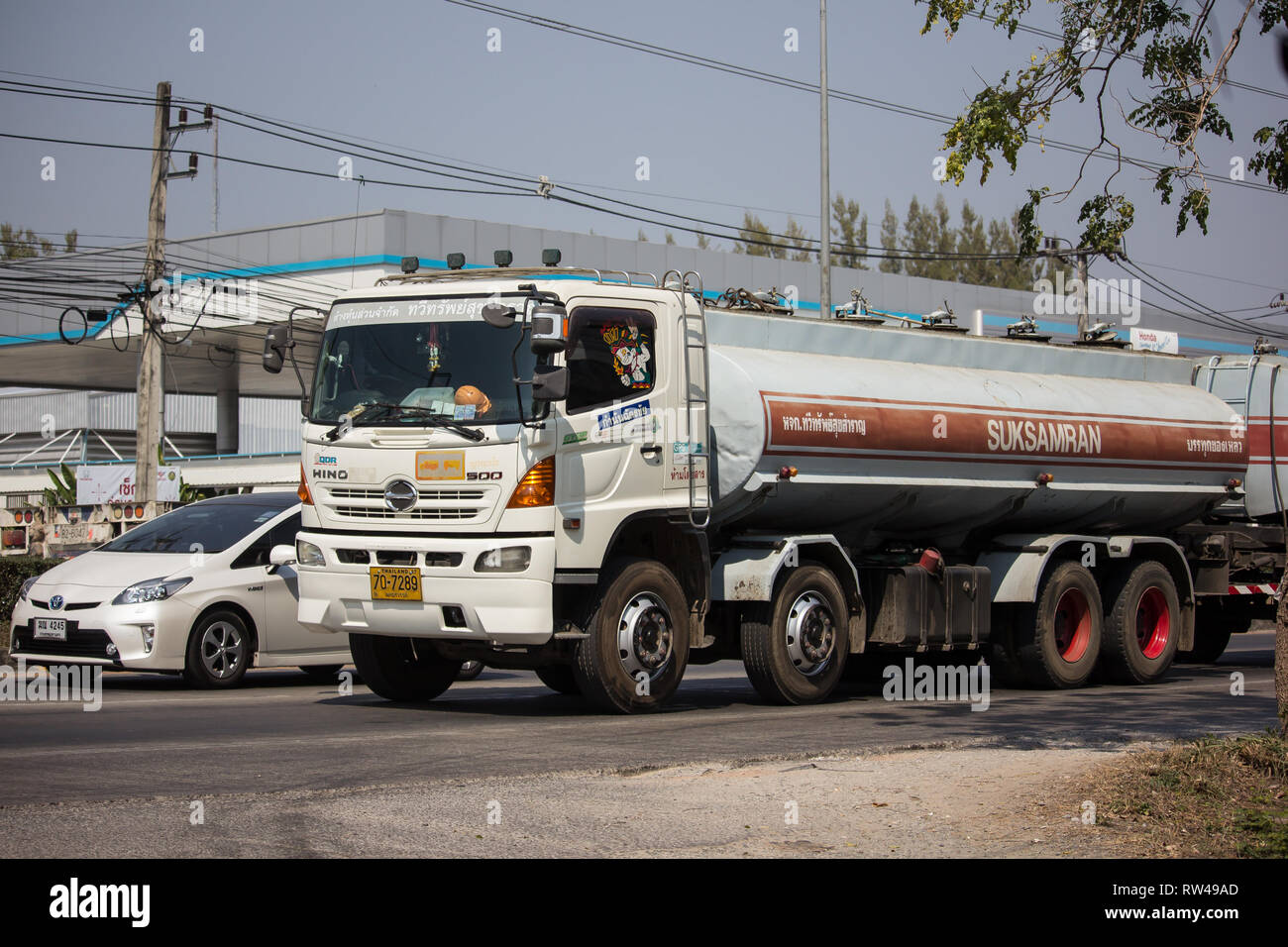 Chiangmai, Thailand - February 11 2019: Trailer Truck and Palm Oil Tank Truck of Suksamran Transport. Photo at road no 121 about 8 km from downtown Ch Stock Photo