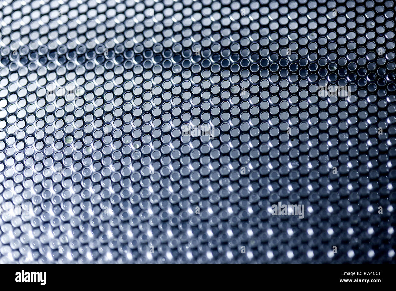 Hexagonal mesh on a blue background. Whole background. Stock Photo
