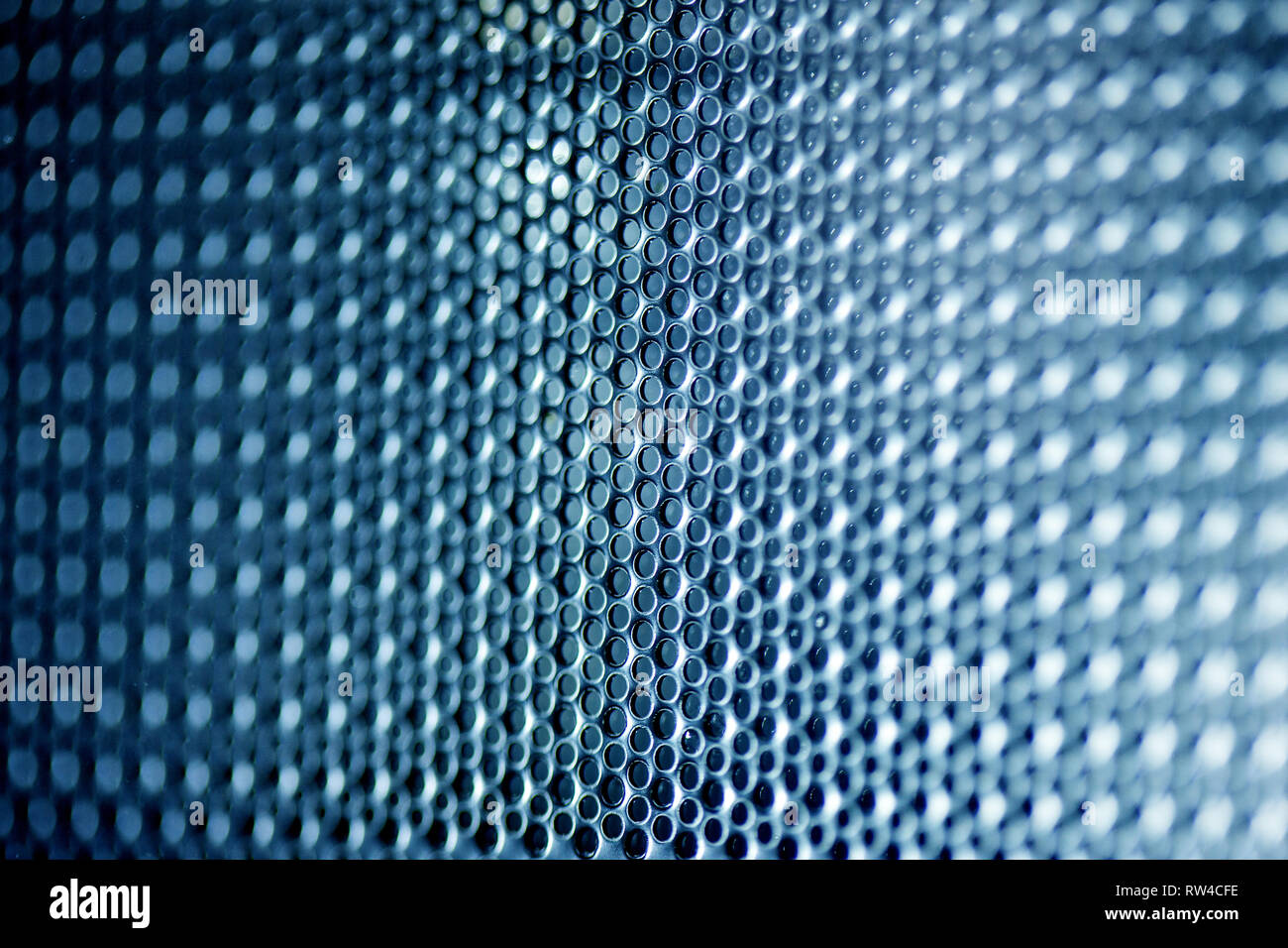 Hexagonal mesh on a blue background. Whole background. Stock Photo