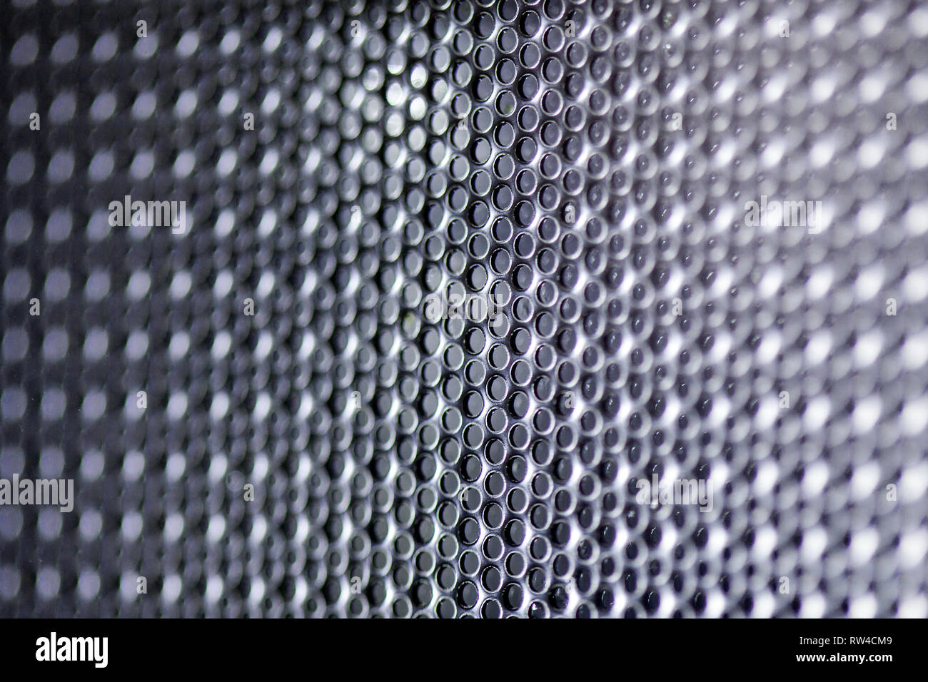 Hexagonal mesh on a blue background. Whole background. Stock Photo