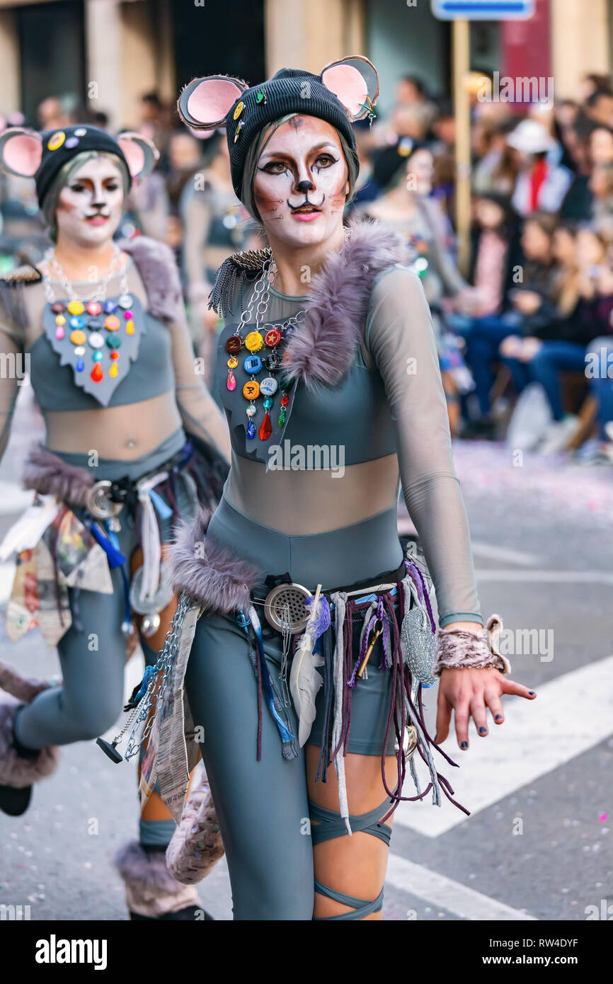 Traditional carnival in a Spanish town Palamos in Catalonia. Many people in  costume and interesting make-up. 03. 03. 2019 Spain Stock Photo - Alamy