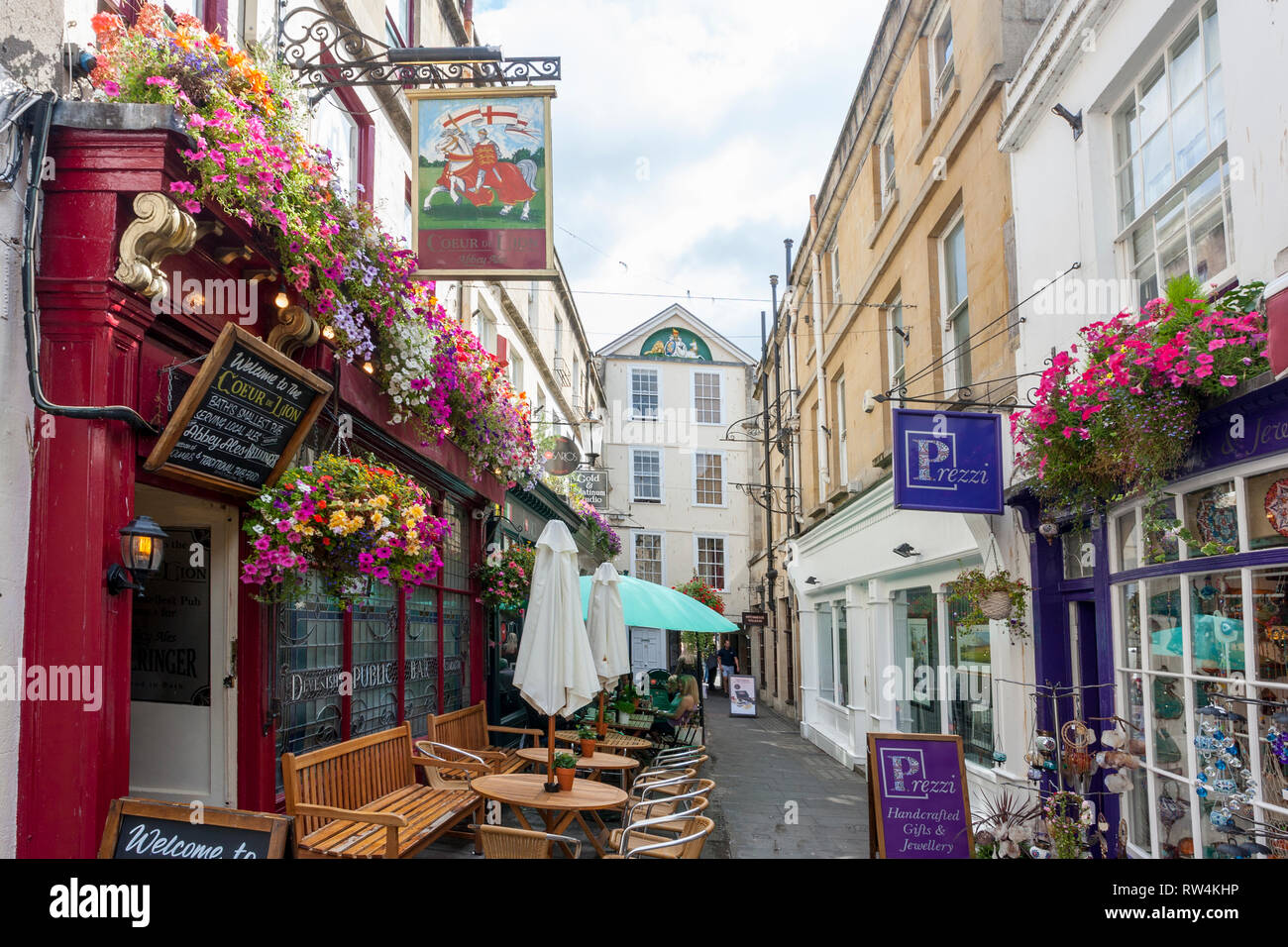 Northumberland Place is one of the narrow passages filled with colourful floral displays, shops and bars in Bath, N.E. Somerset, England, UK Stock Photo