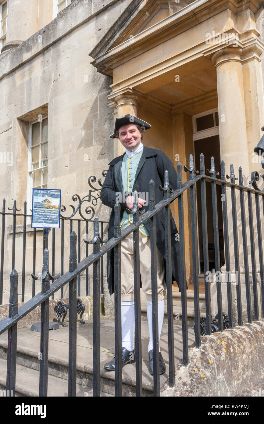 A man in period costume greets visitors to No.1 Royal Crescent in Bath, N.E. Somerset, England, UK Stock Photo