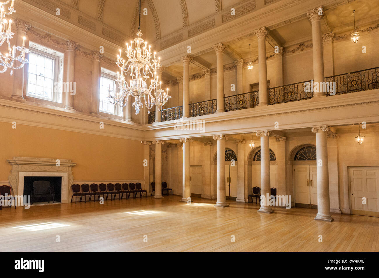 A magnificent glass chandelier and polished floor in the Tea Room of
