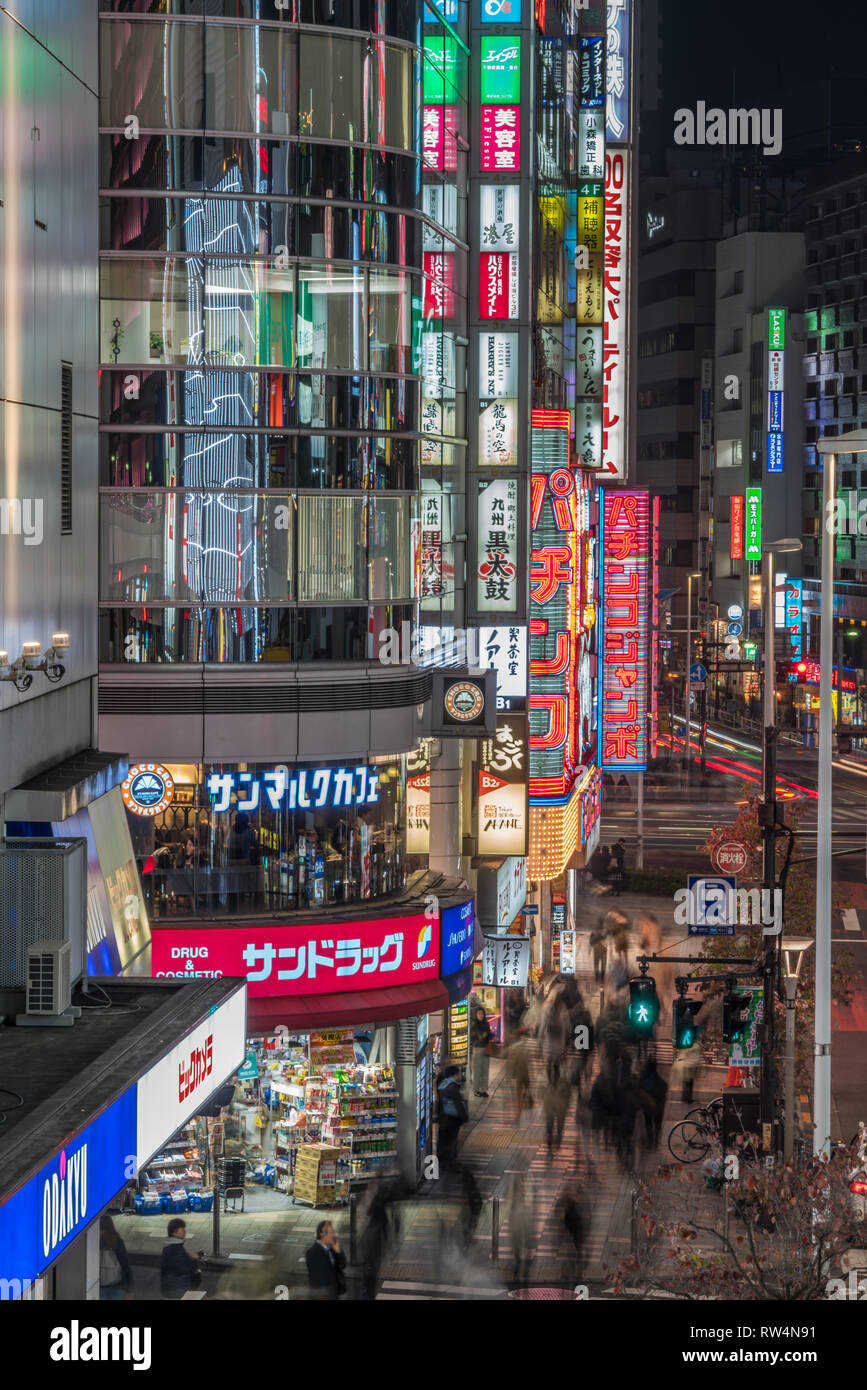 Nishishinjuku Shinjuku Ku Tokyo Japan November 17 Colorful Busy Street And Billboards Motion Blurred People Passing Along Shops Around S Stock Photo Alamy