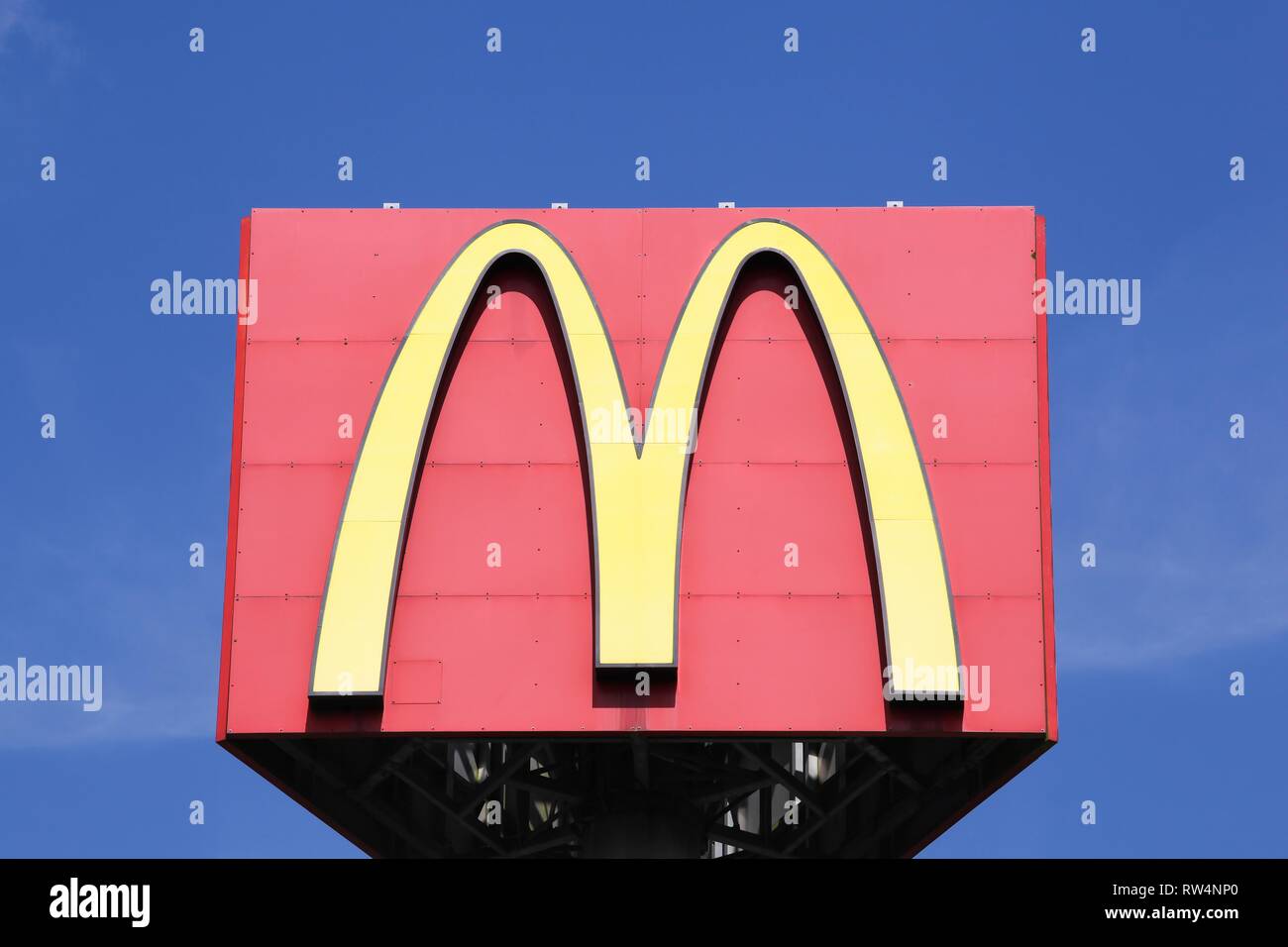 Emstek, Germany - July 22, 2018: Mc Donald's logo on a pole. McDonald's is the world's largest chain of hamburger fast food restaurants Stock Photo