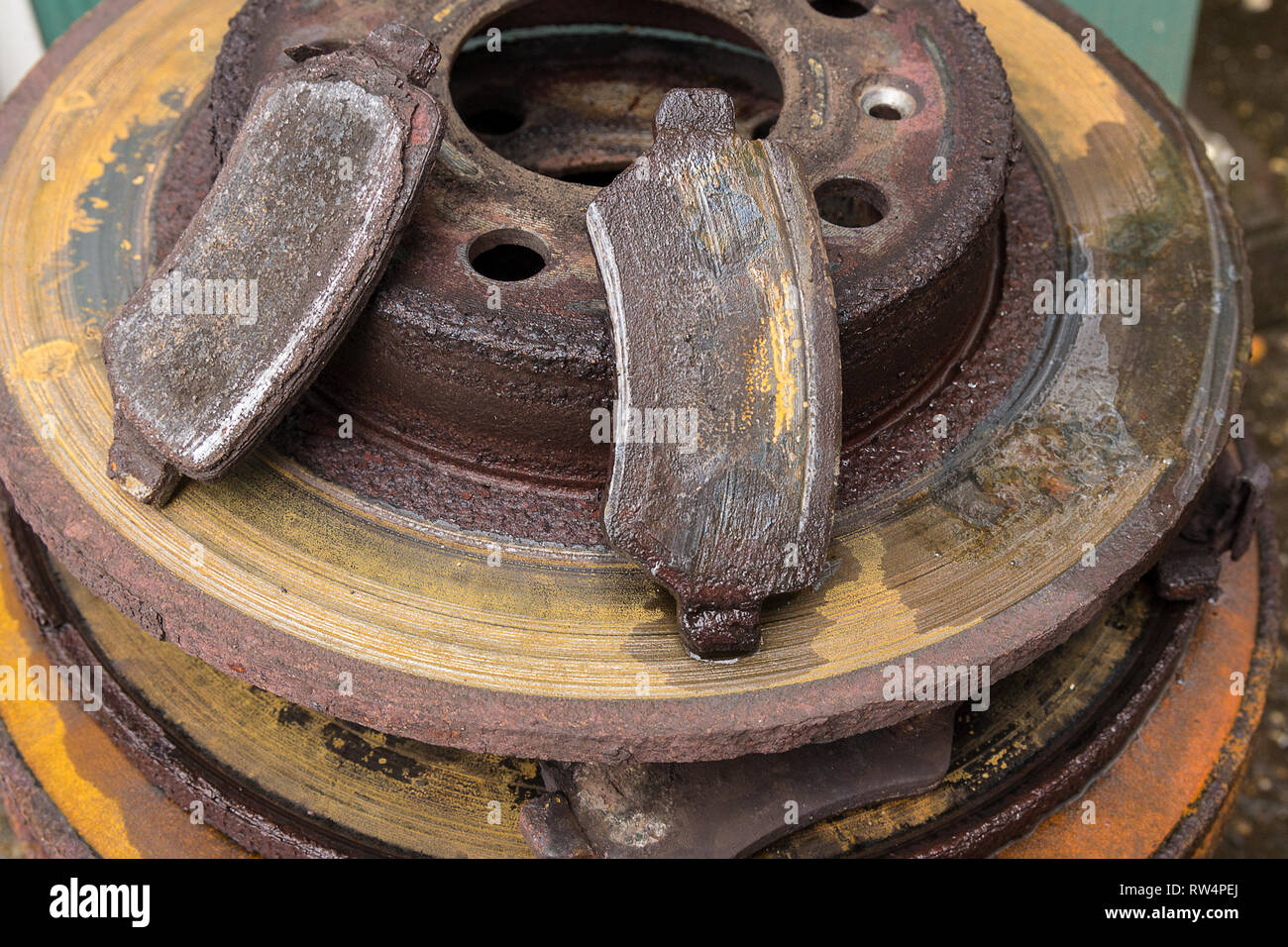 Car brake parts worn and rusty ready for recycling. The brake pads have  little or no friction material left causing extra wear on the brake discs  Stock Photo - Alamy