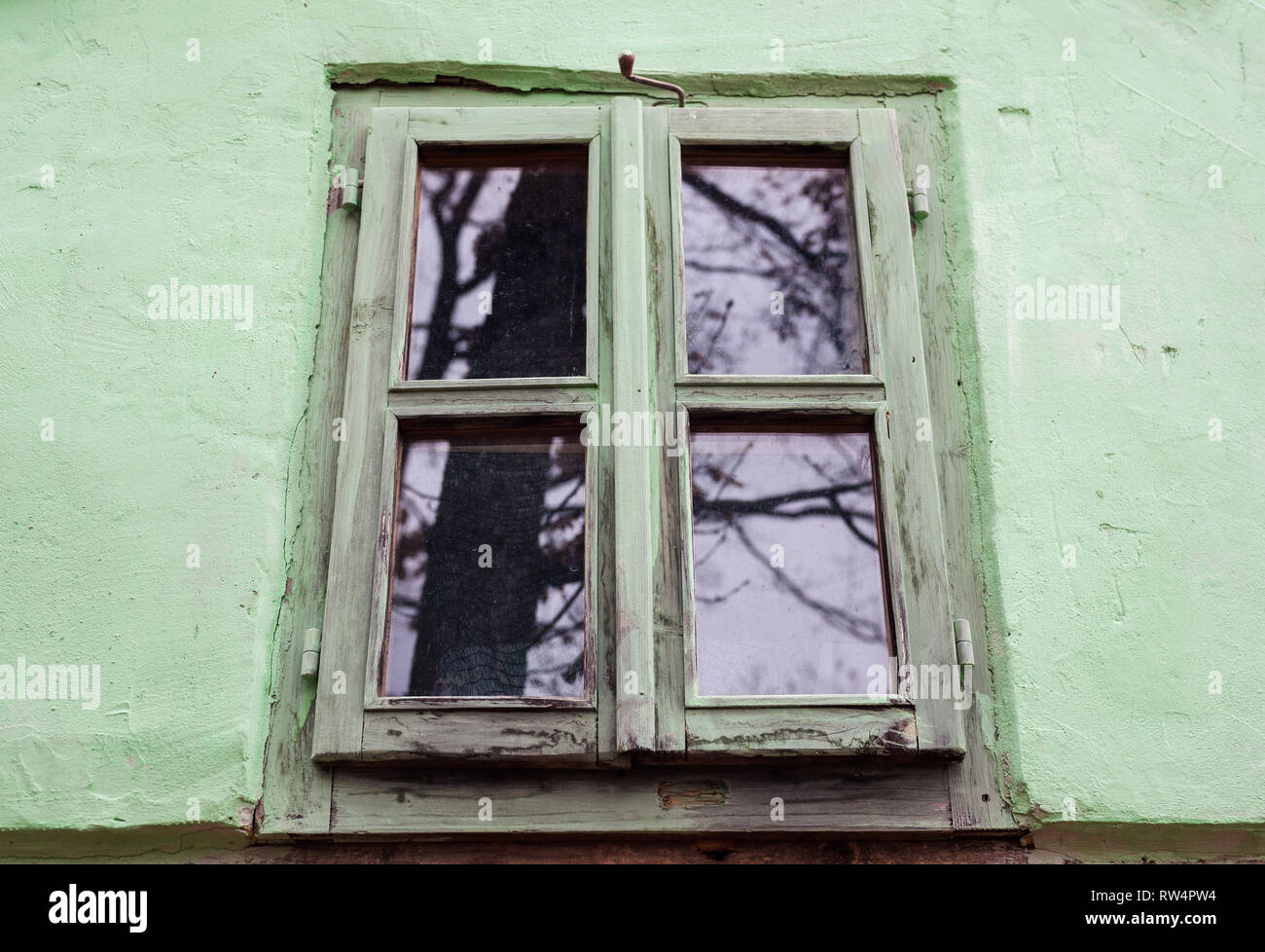 Abstract composition, one old wooden window and green wall Stock Photo ...
