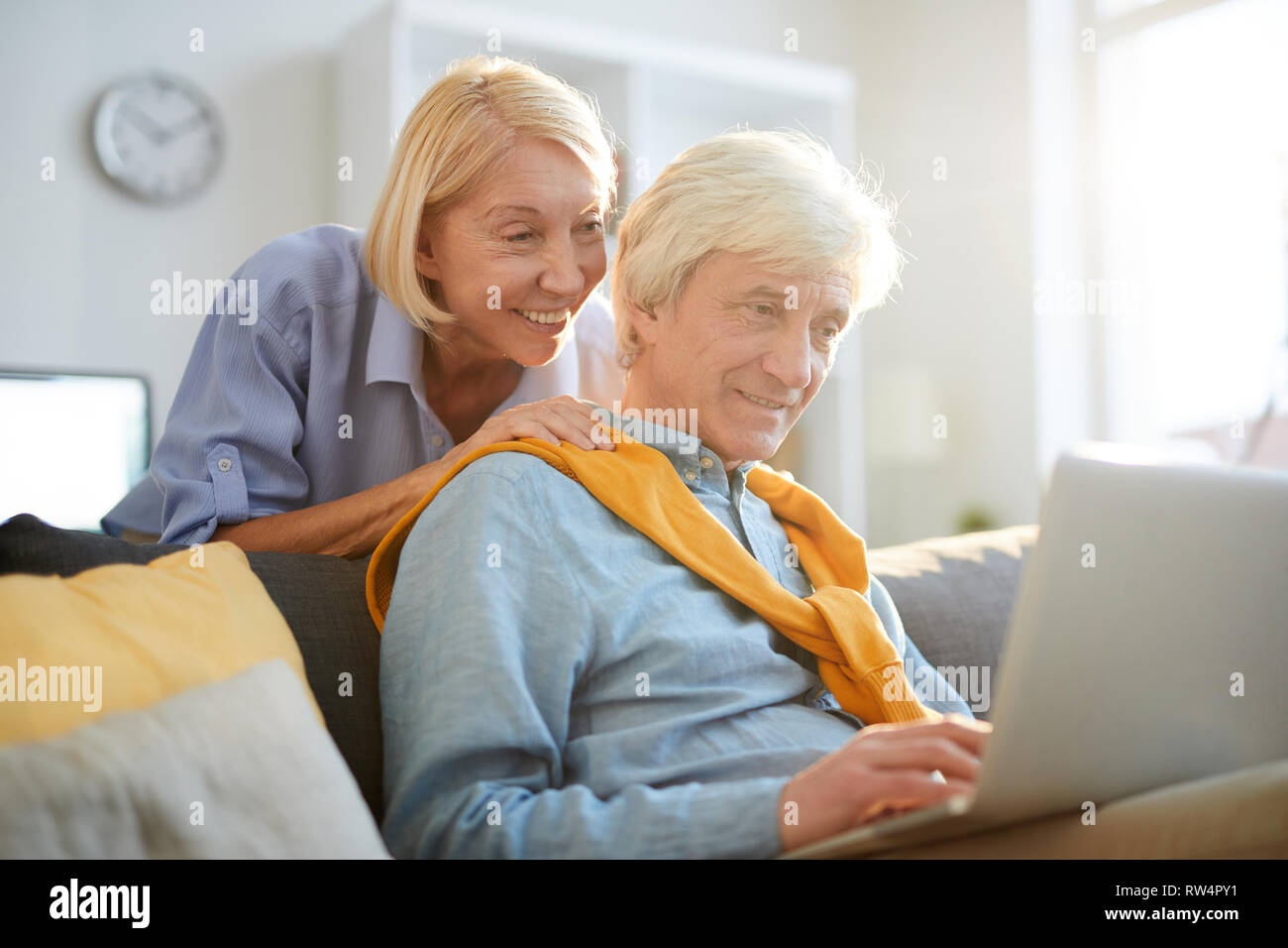 Contemporary Senior Man Using Laptop Stock Photo
