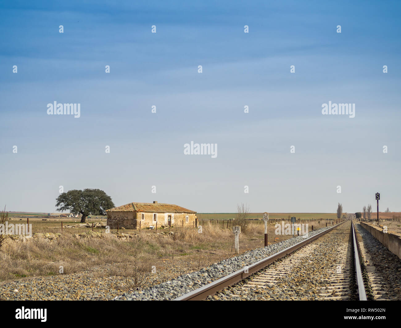 Small Rural Train Station Rural landscape of a railway track and a small railway station Stock ...