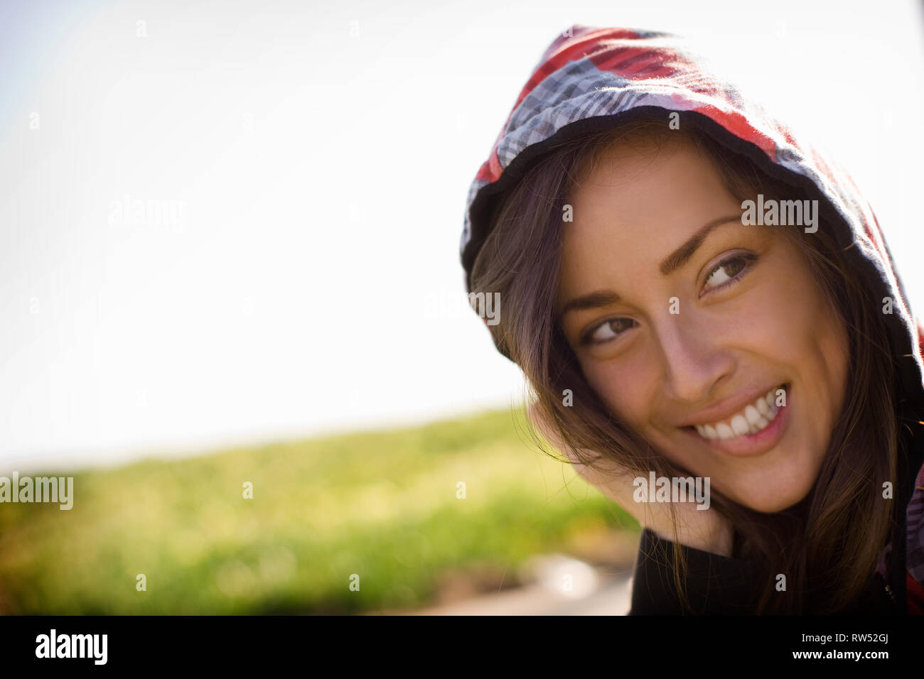 Woman wearing hooded sweatshirt hi-res stock photography and images - Alamy