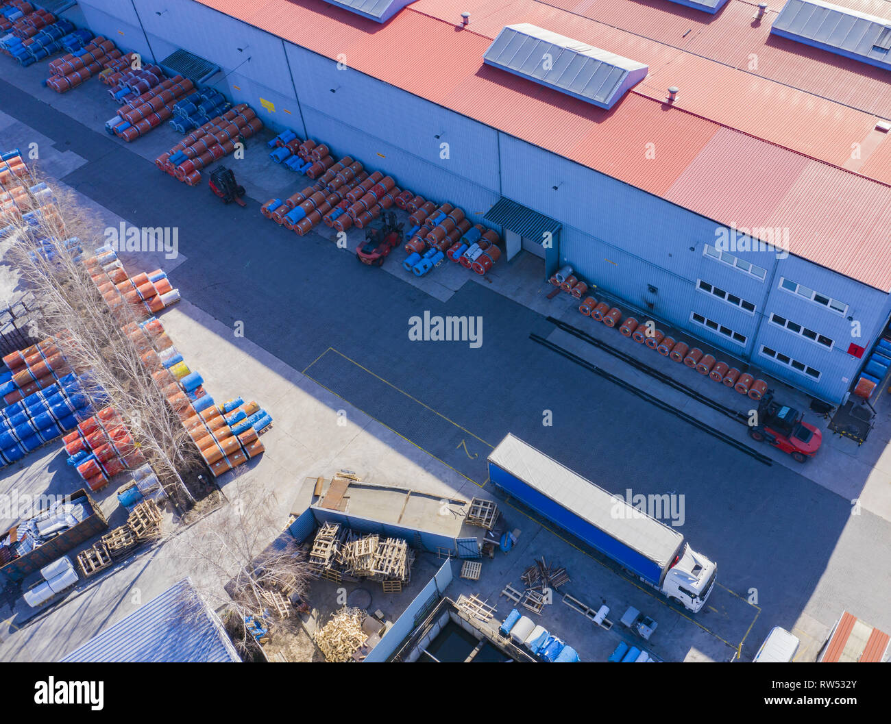 Aerial view of goods warehouse. Logistics center in industrial city ...