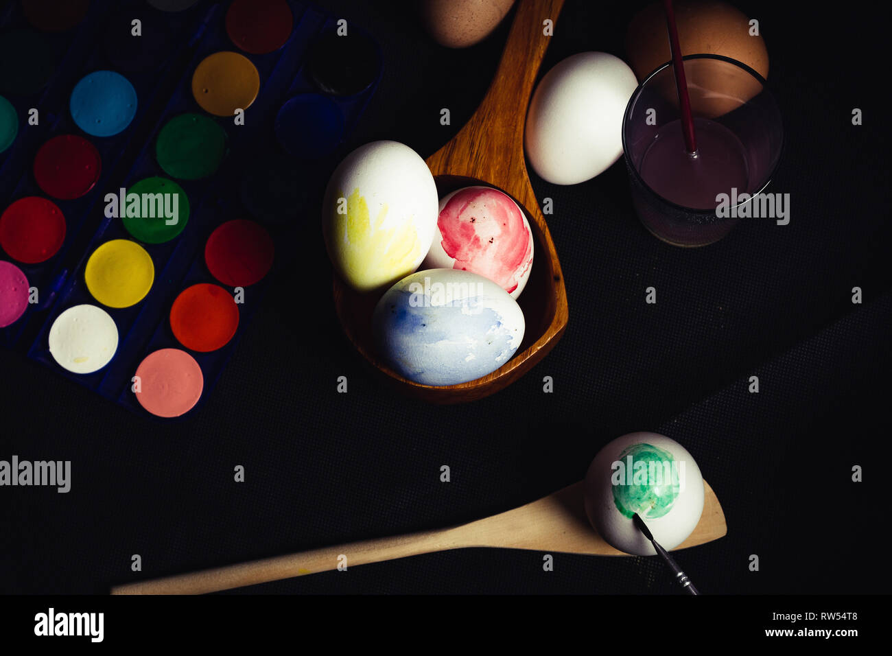 Crop hand painting Easter egg Stock Photo