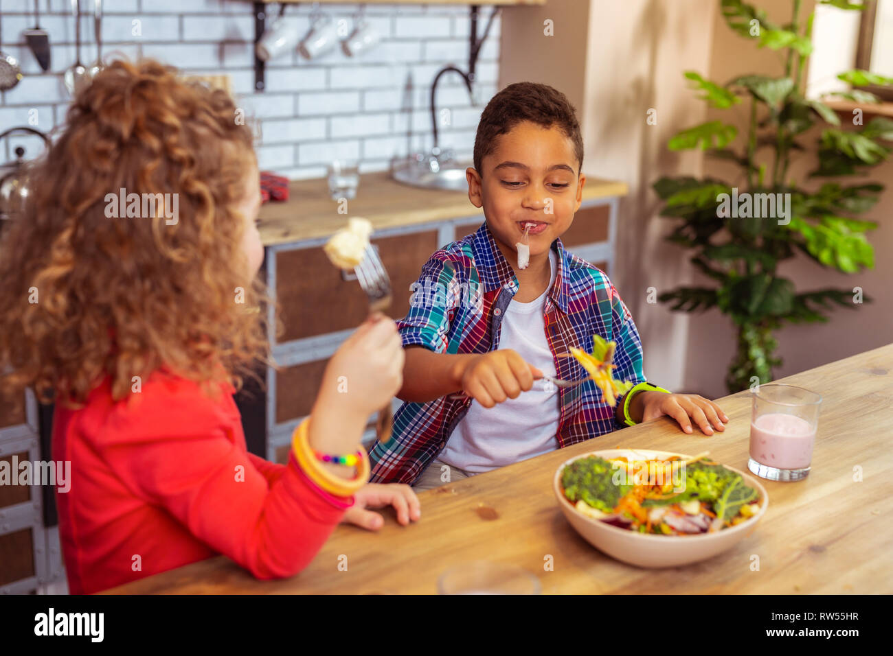 African boy eating dinner hi-res stock photography and images - Alamy