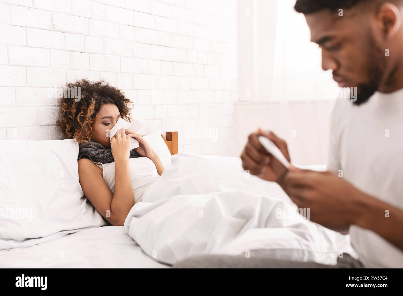 Man woman bed hi-res stock photography and images - Alamy