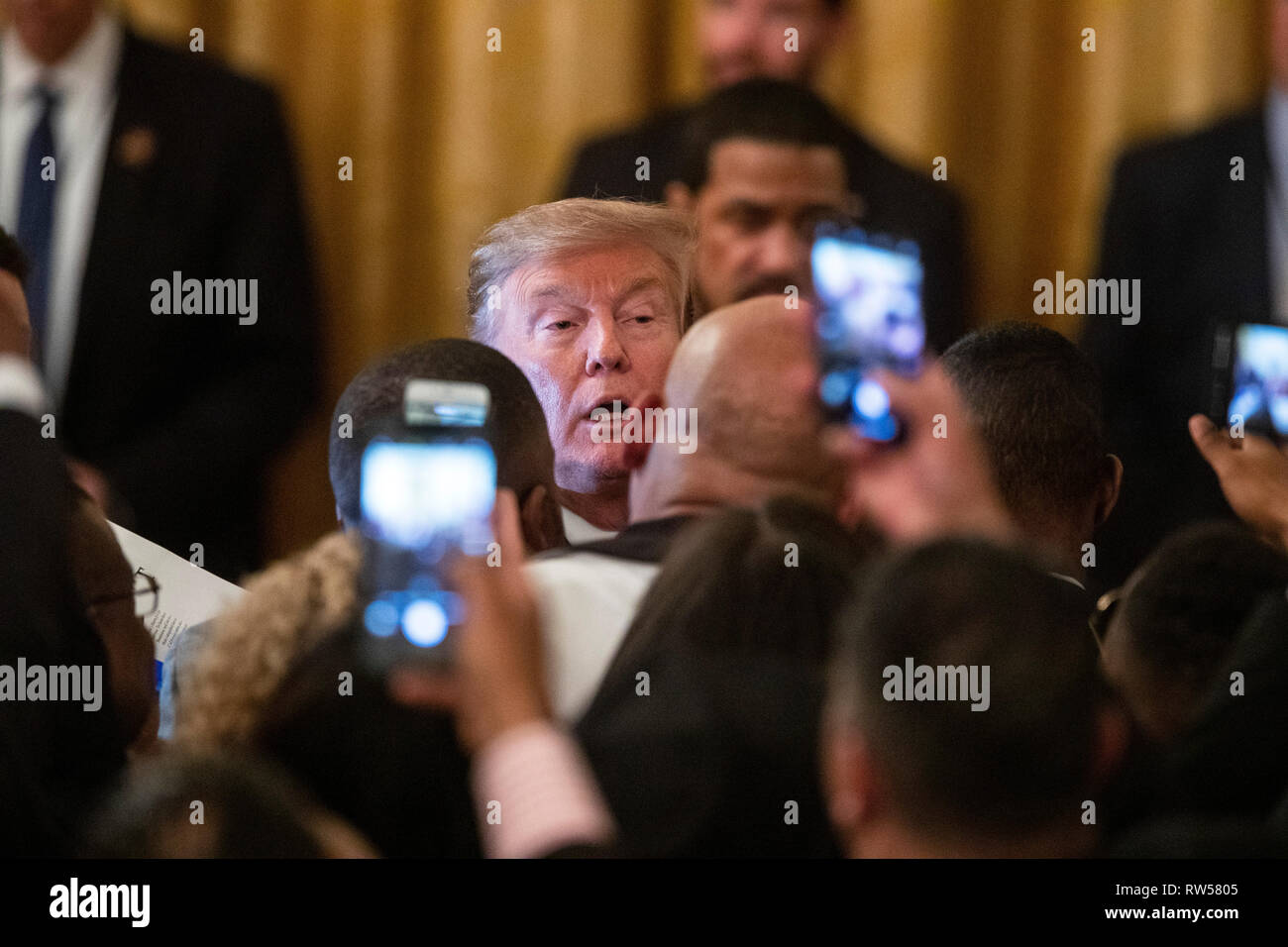 U.S. President Donald Trump greets guests after speaking at a National African American History Month reception at the White House in Washington, D.C., U.S., on Thursday, Feb. 21, 2019. Stock Photo