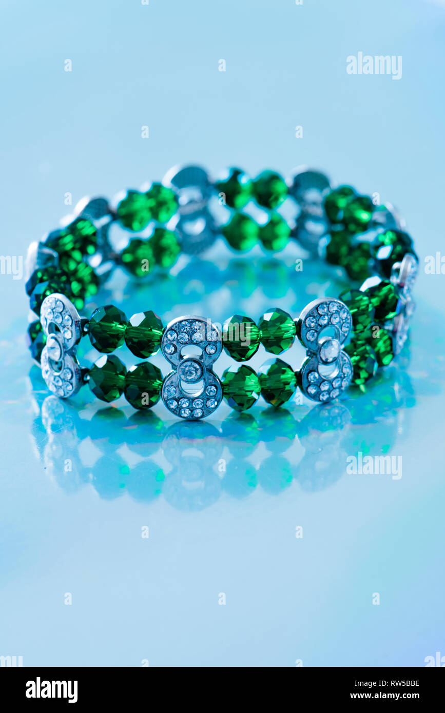 Costume Jewelry on a holographic background Stock Photo