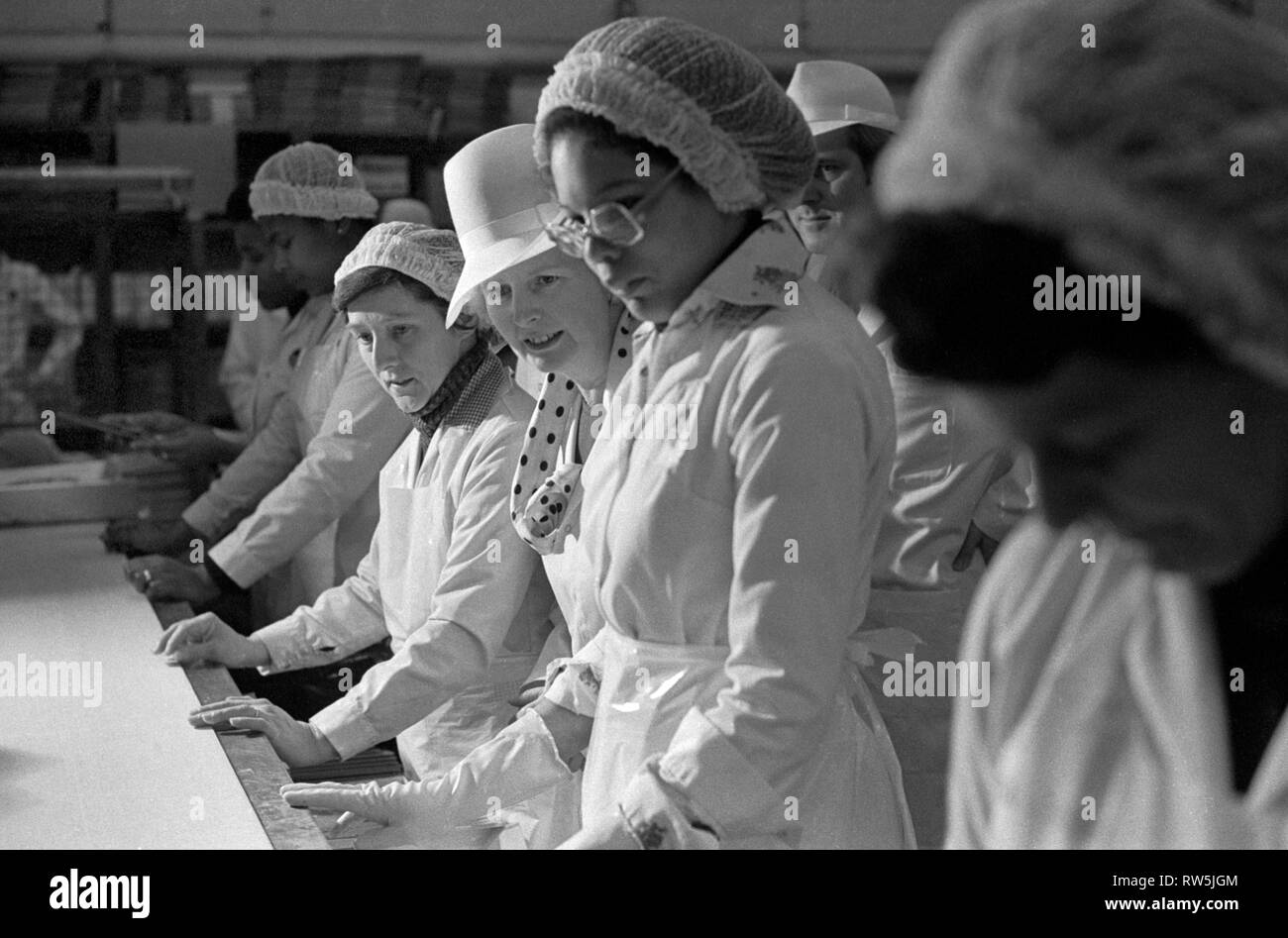 Margaret Thatcher campaigning for the 1979 General Election in Northampton. Visit to the Telfers sandwich factory. meeting women factory workers on the production line. 1970S HOMER SYKES Stock Photo