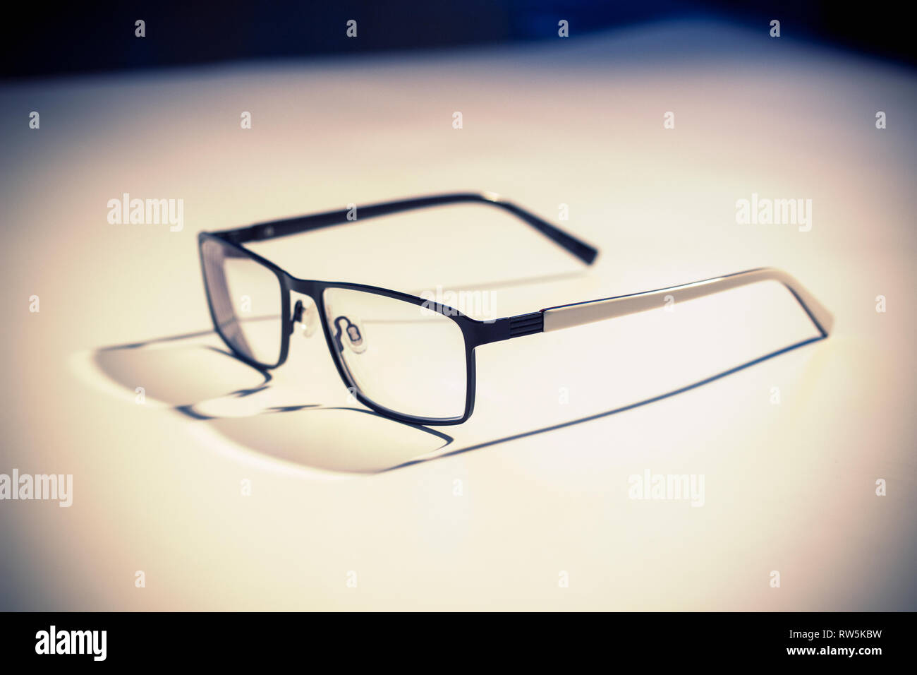 Square framed glasses with white arms Stock Photo