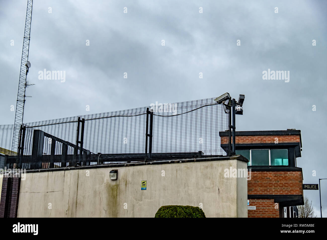 ENNISKILLEN, ULSTER / NORTHERN IRELAND - MARCH 03 2019 : The Kesh police station is protected by a huge fence a couple of days before the Brexit. Stock Photo