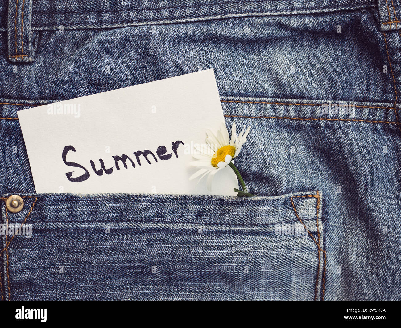 Wildflowers, paper note with the word SUMMER on the background of a ...