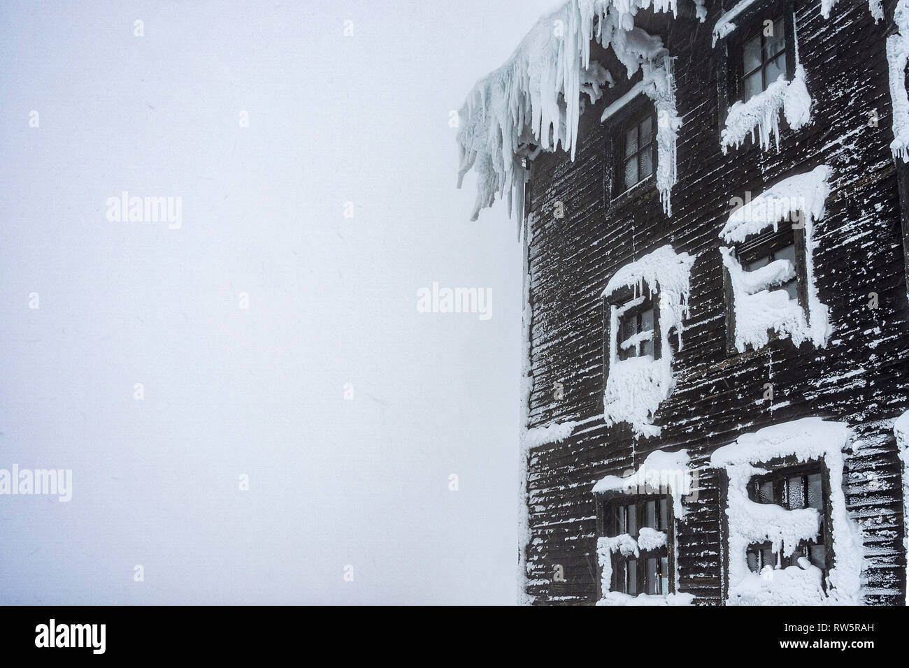 Detail View Of Mountain Cabin In A Misty Weather Foggy Weather In