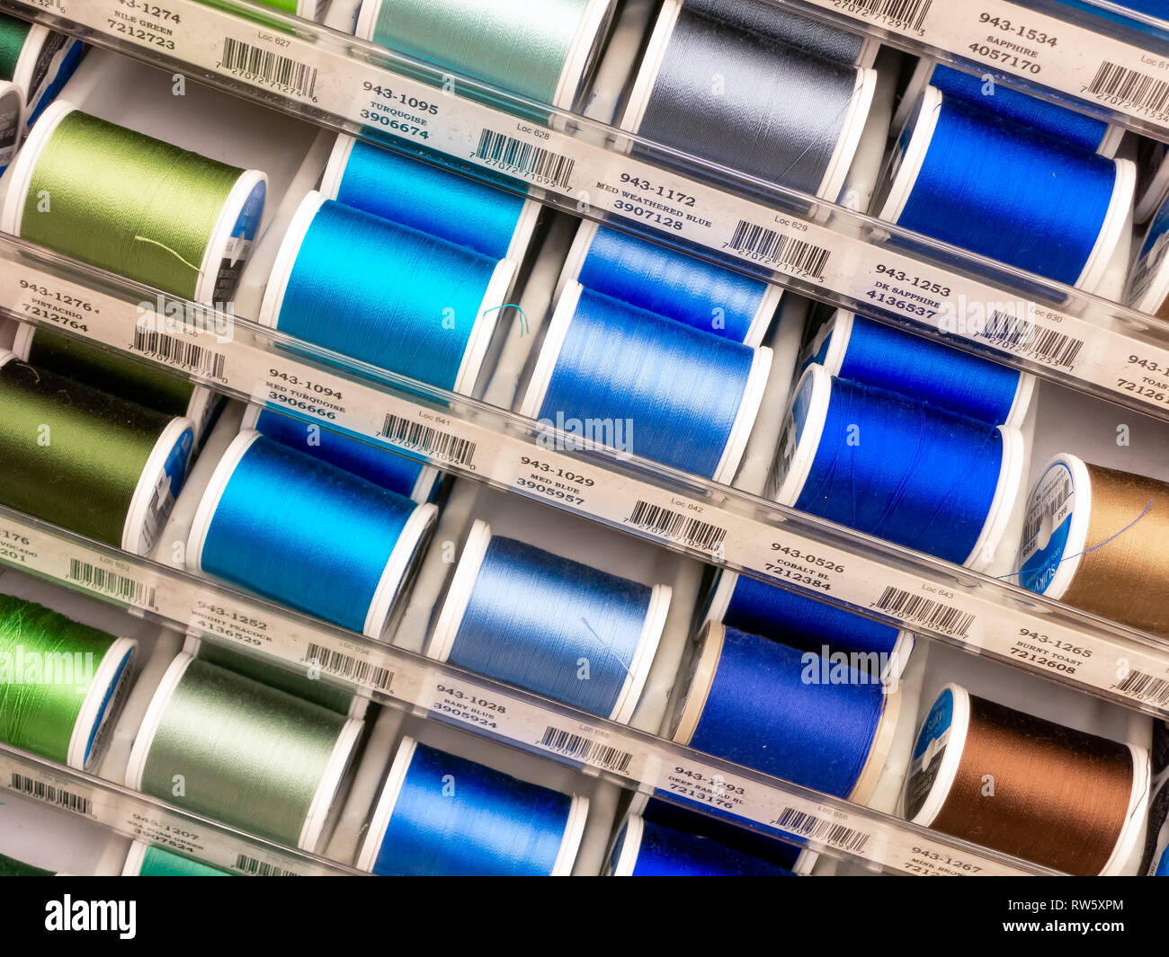 ST. PAUL, MN/USA - MARCH 3, 2019: Sulky of America spools of thread and trademark logo. Sulky is a manufacter of thread and craft supplies. Stock Photo