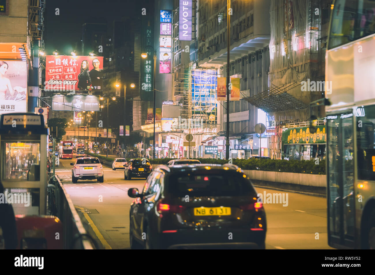 Hong Kong, Hong Kong - October 16, 2018: People are traveling in the night street of Nathan Road. Stock Photo