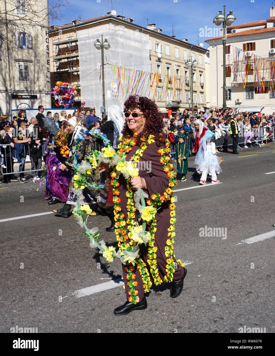 Rijeka, Croatia, March 3rd, 2019. Smiling and masked woman with costume
