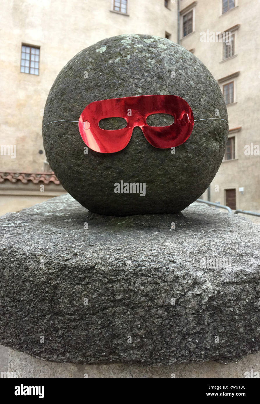New Year mask put on the stone ball in the courtyard of the Krumlov Chateau in Český Krumlov, Czech Republic, pictured on 1 January 2019. Stock Photo