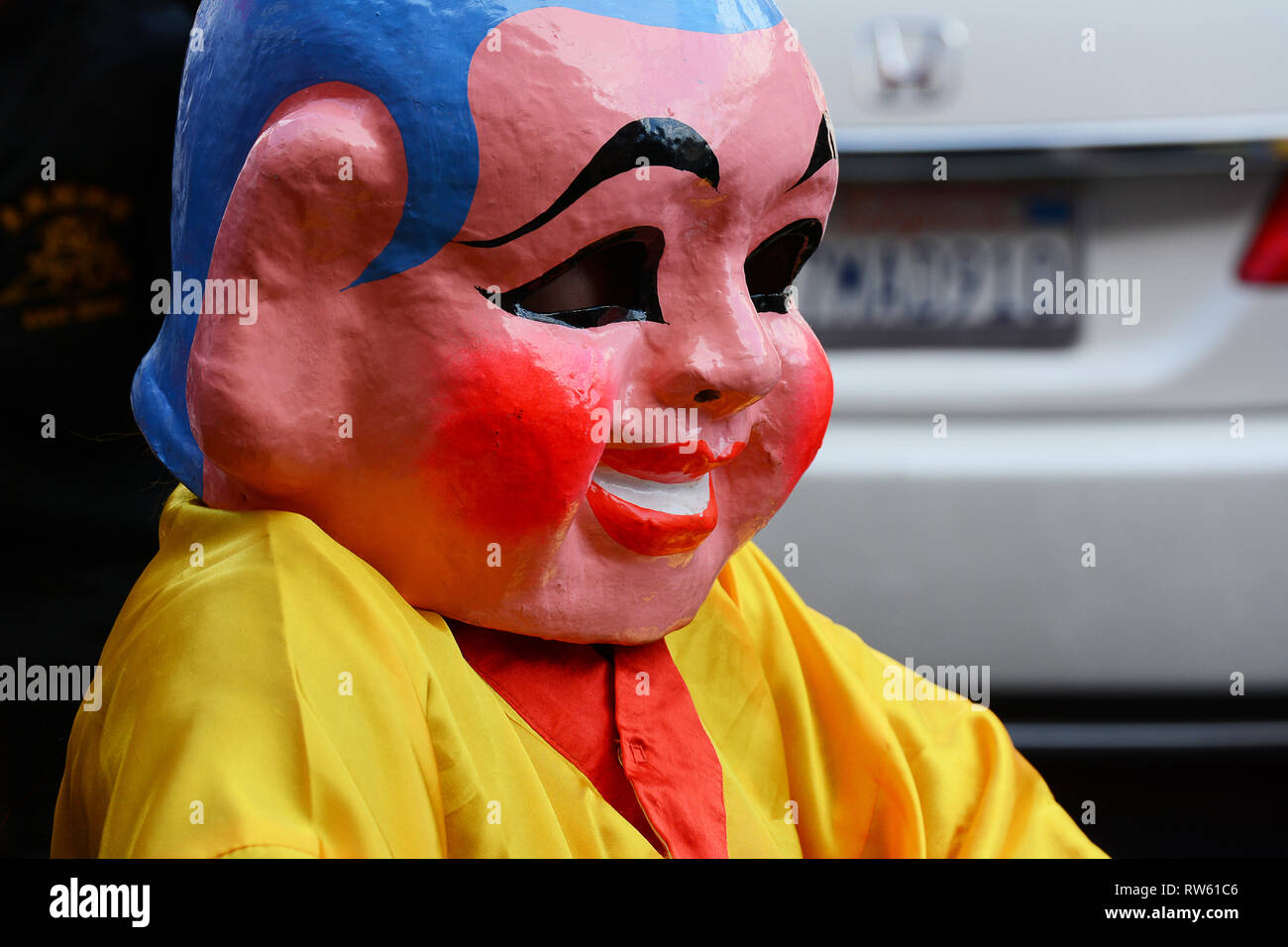 LOS ANGELES - FEBRUARY 9, 2019:  Masked performer at the Golden Dragon Parade, celebrating the Chinese New Year. Stock Photo