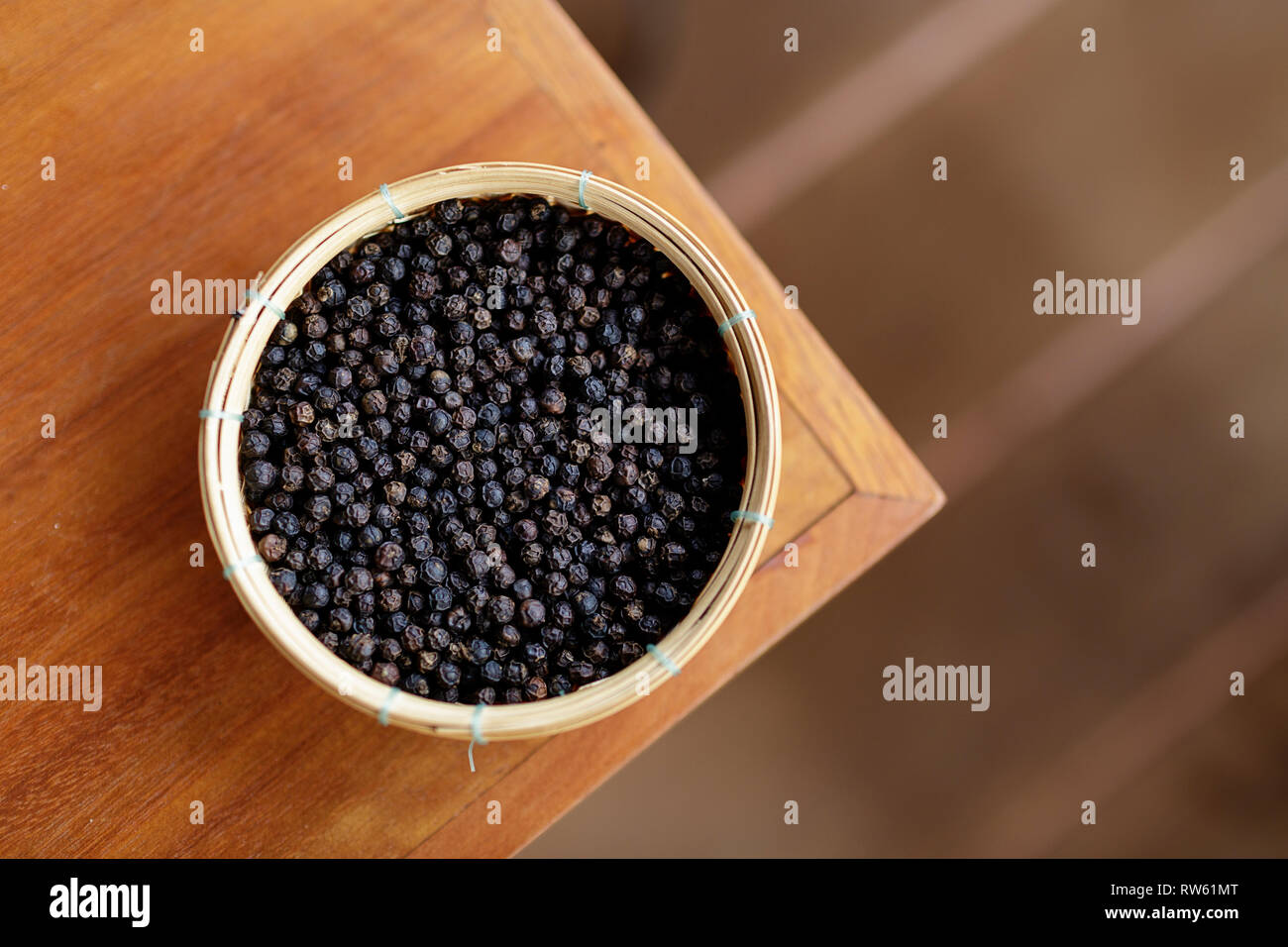 Peppercorns red and black peppercorns of Kampot Pepper at a pepper
